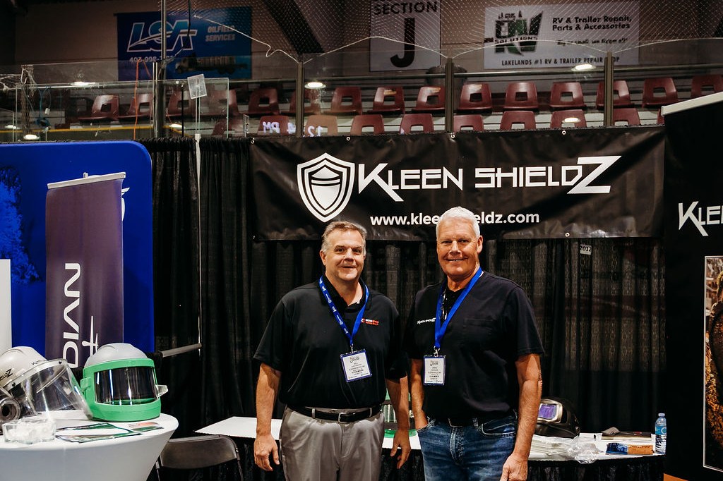 Exhibitor booths and visitors on the BOAGS show floor